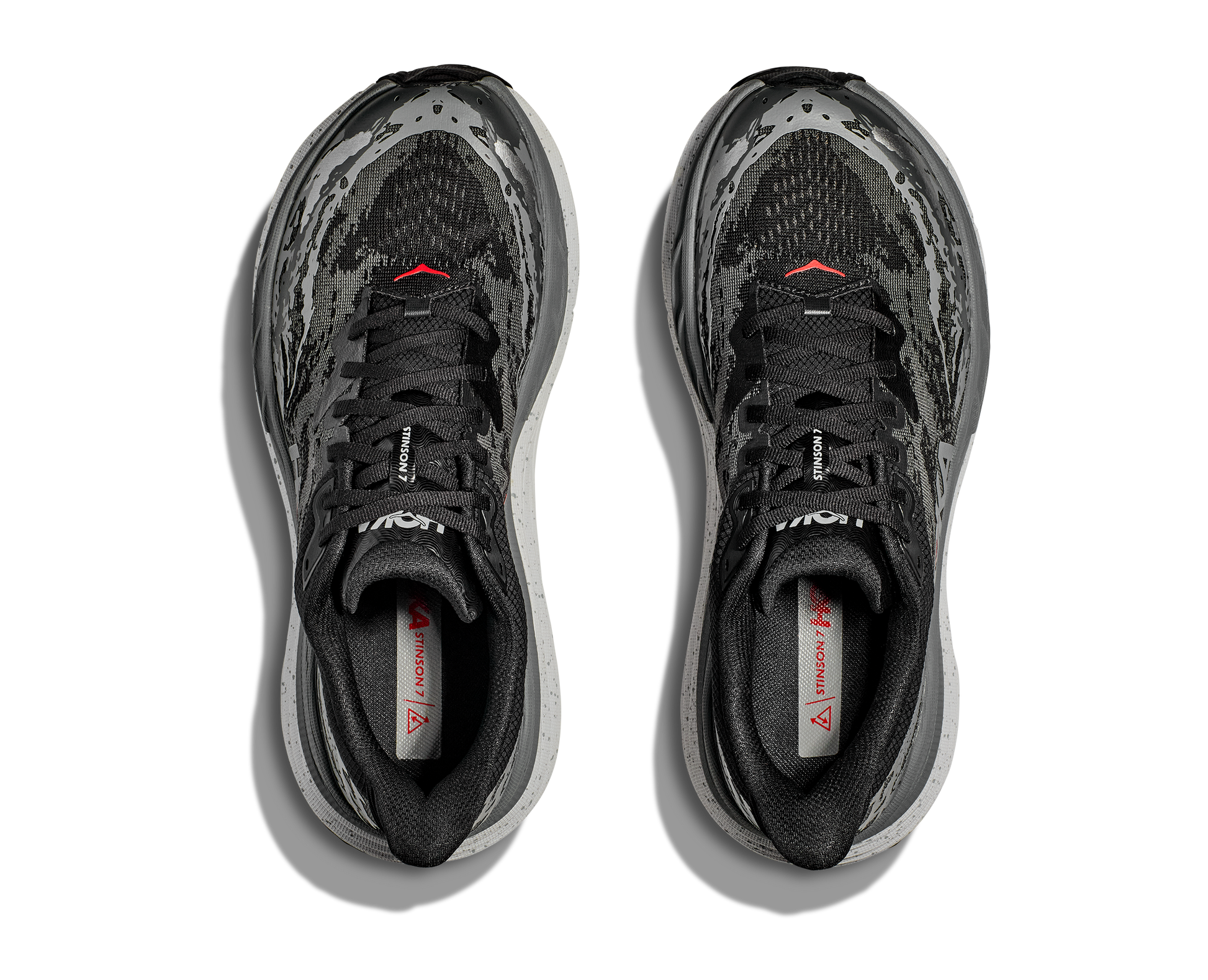 grått och vit med små röda detaljer.