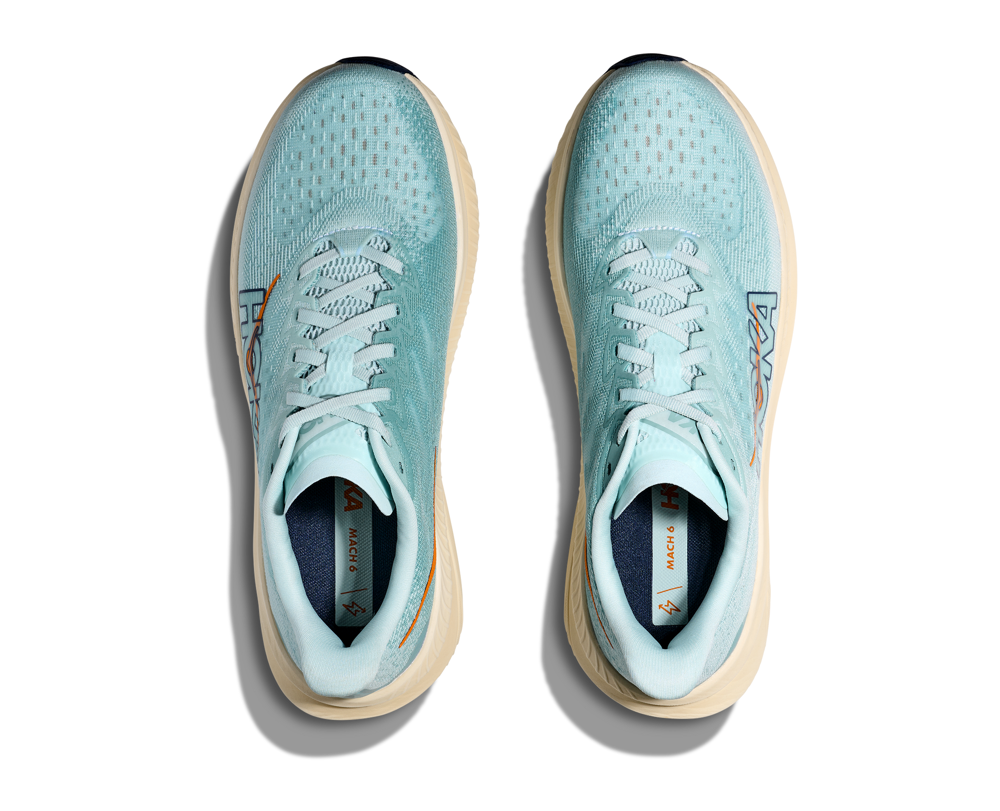 tävling och löpbandet. Färgen här är ljusblå med beige sula och orangea och svarta detaljer.  Köpt hos oss