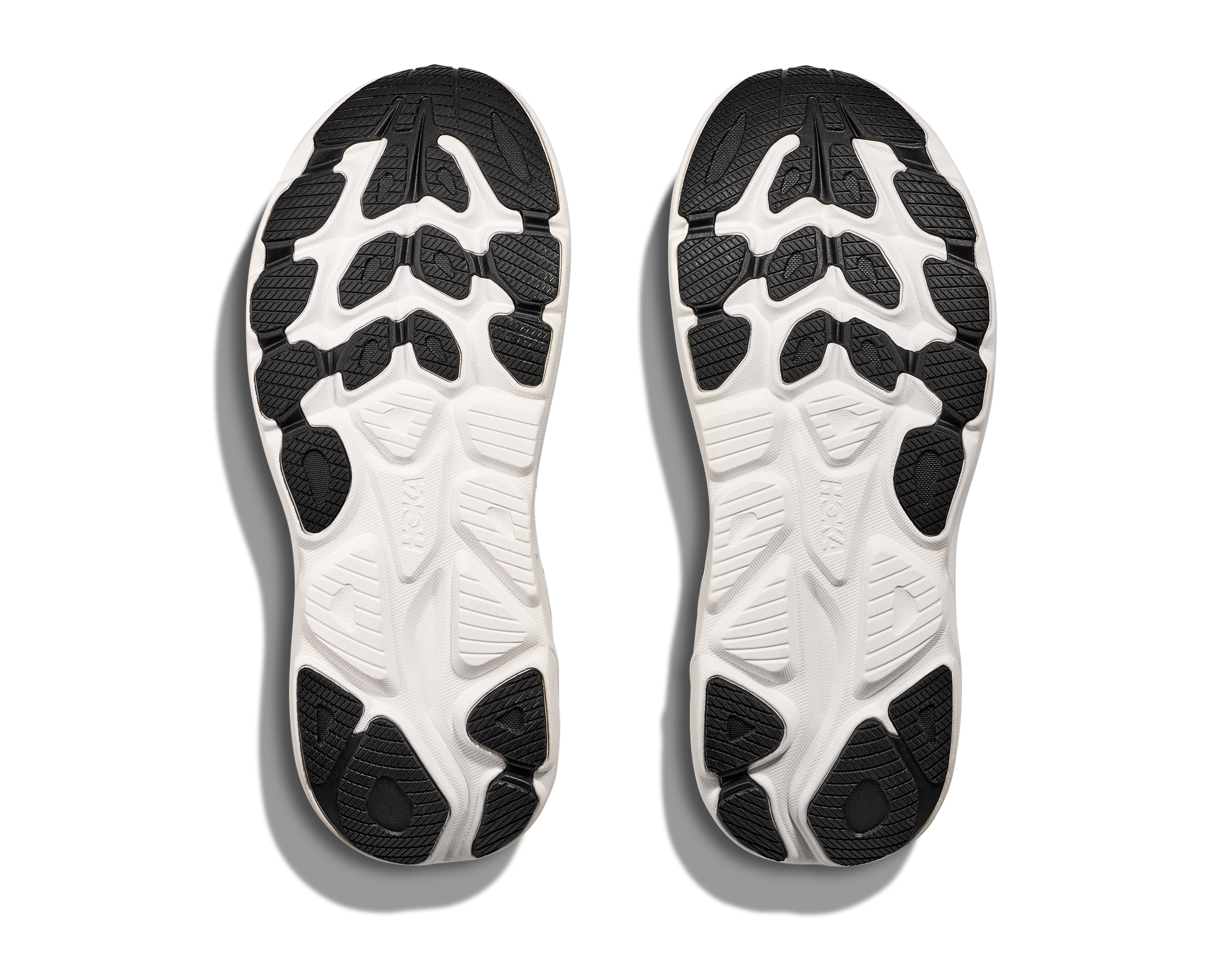 Hoka M Clifton 10 - Löparskor med dämpning. Svart och vita i färgen. Passar bra på asfalt och inomhus. Köp hos dina Hoka specialister i Sverige idag!