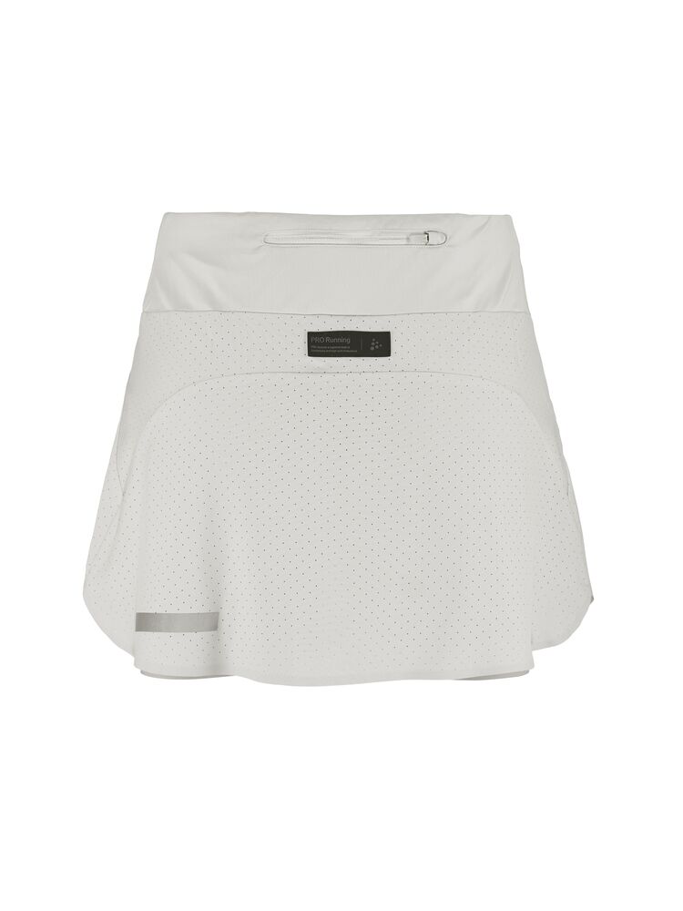 integrerade innertights i ventilerande mesh. Här i vitt. Ficka med dragkedja i ryggen.