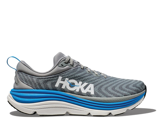 Hoka M Gaviota 5. Stabil och mycket dämpad springsko i herrmodell. Grå toner i färg med vita och blåa detaljer. Hos Hoka specialisterna i Sverige.