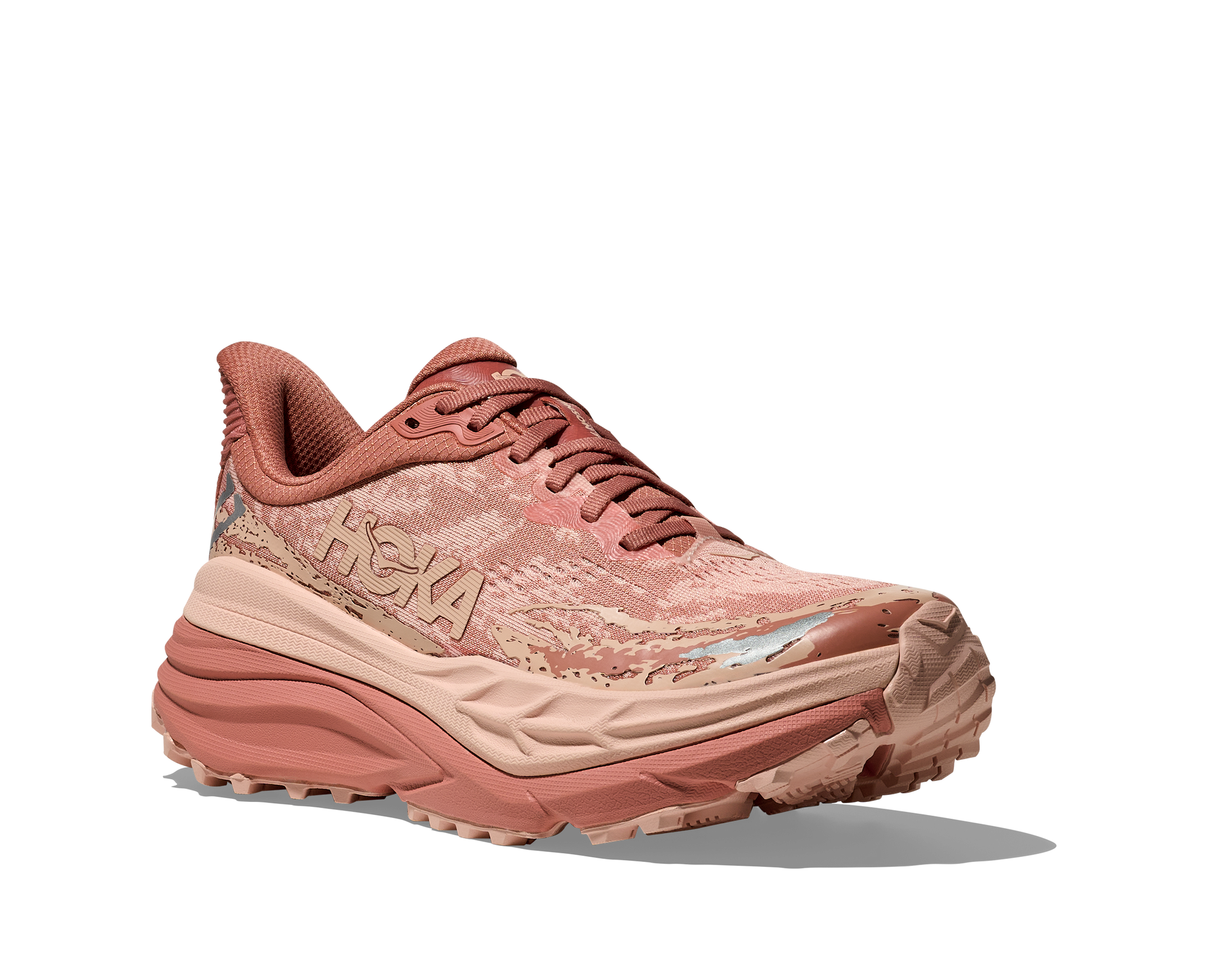  dammodell. Hybridsko för alla underlag. En av Hokas stabilaste skor med pronationsstöd. En väldämpad sko som avlastar rygg och knä. Färgen här är rosa och beige. 