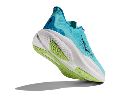 Hoka W Mach 6 (CSSW) - En snabb löparsko med skön dämpning. Blå/Vitt färg med lila och gröna detaljer. 