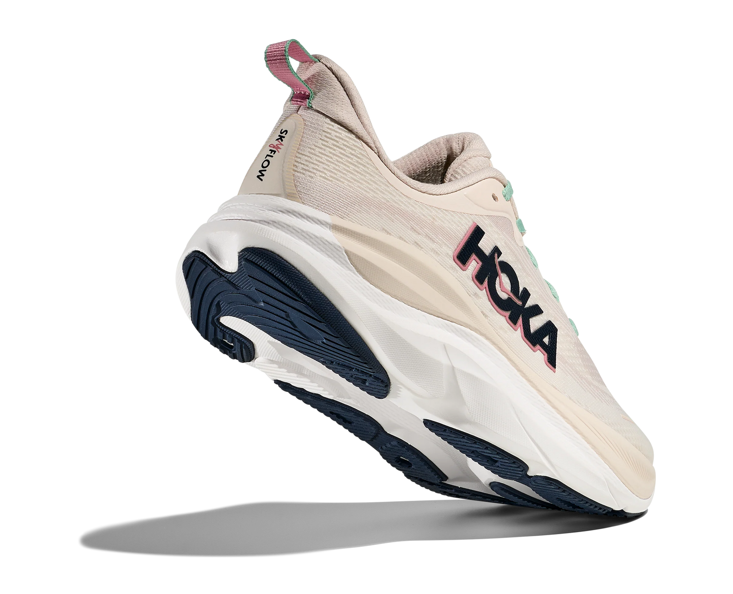  löparskor i beige och vit färg med detaljer i rosa