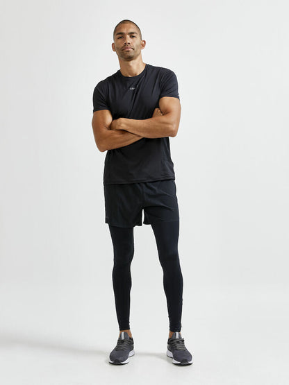 Craft ADV Essence Zip Tights. Svarta tights med elastiskt resår samt dragsko i midjan. Stor mobilficka höger ben. Ficka med dragkedja baktill. Dragkedja vid benslut. Reflekterande print baktill.