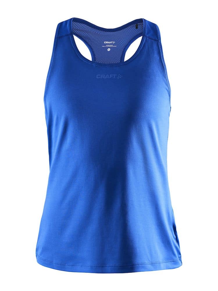 Craft Adv Essence Singlet W. Mjukt och funktionellt träningslinne i blått. Racerback-design med meshdetaljer för extra ventilation. Liten Craftlogga på fram- och baksidan.