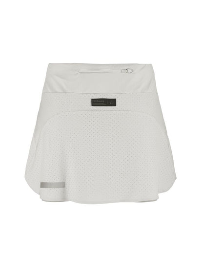  integrerade innertights i ventilerande mesh. Här i vitt. Ficka med dragkedja i ryggen. 