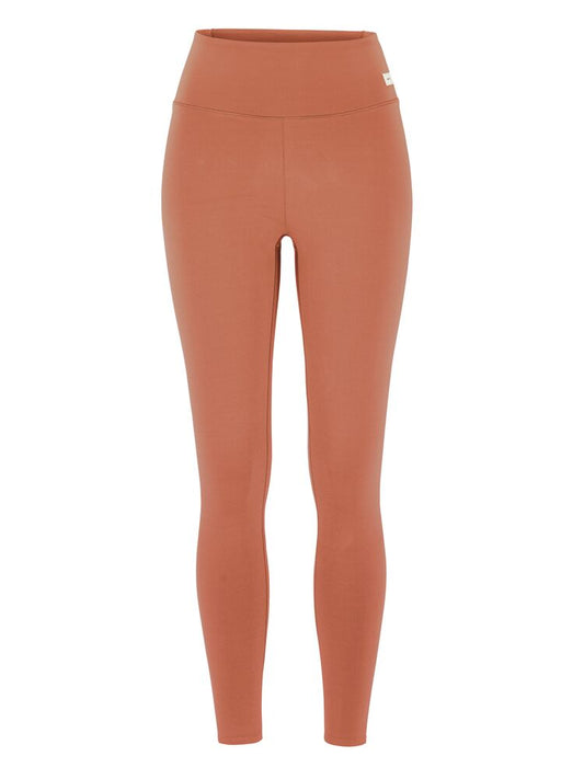 Craft Collective 7/8 Tights W. Träningstights till dam i röd/brun nyans. För träning och vardagsliv. 7/8-dels benlängd samt hög midja. Craft etikett på höften.