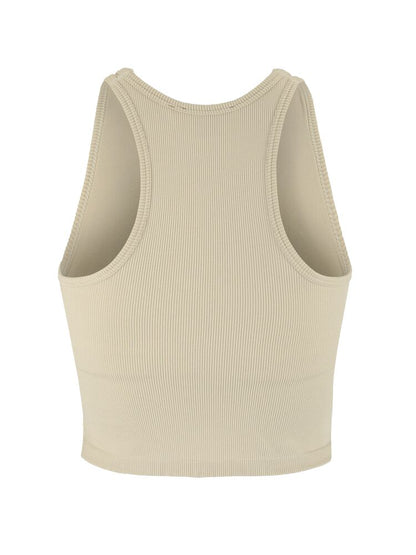 Craft Collective Rib Tank Top W. Sömnlös träningstopp i mjuk och ribbad kvalitet till dam. Kroppsnära passform och ribbad ytstruktur skapar skön och följsam känsla. Beige och med vit Craft etikett nedtill vänster fram. 