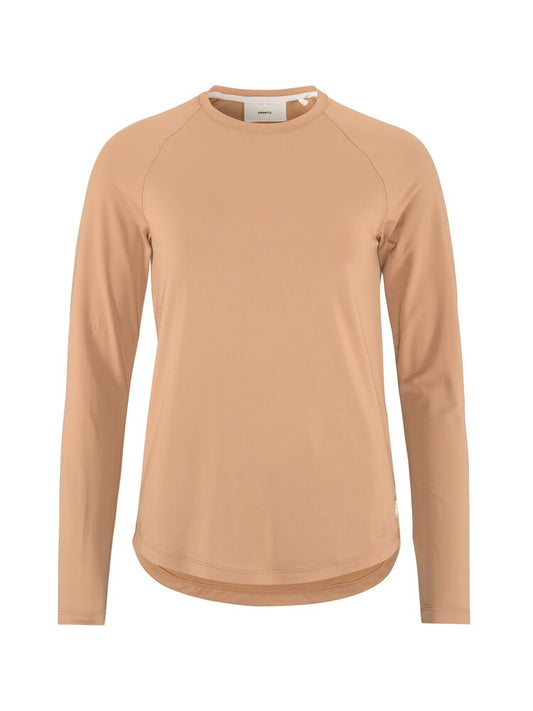 Craft Collective LS Tee W. Långärmad tränings-t-shirt för dam. Raglanärmar och rundan nederkant för en feminin siluett. Regular fit. Här i rosa nyans. 