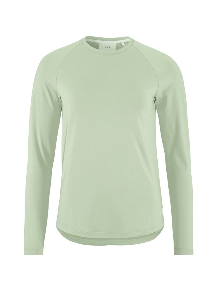 Craft Collective LS Tee W. Långärmad tränings-t-shirt för dam. Raglanärmar och rundan nederkant för en feminin siluett. Regular fit. Här i ljusgrön nyans. 